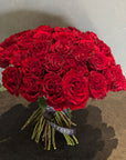 Hand - tied Bouquet of Red Roses