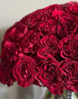 Hand - tied Bouquet of Red Roses