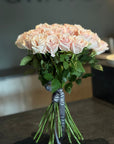 Hand - tied Bouquet of Pink Roses
