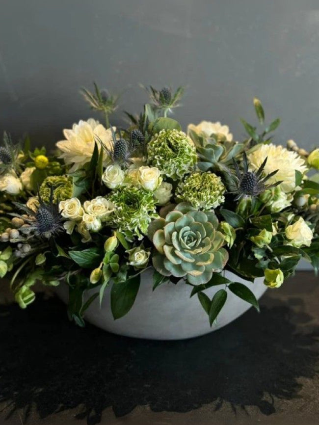 white roses and succulents The Hydra