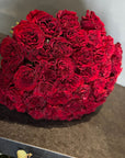 Hand - tied Bouquet of Red Roses