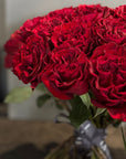 Hand - tied Bouquet of Red Roses
