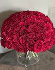 Hand - tied Bouquet of Red Roses