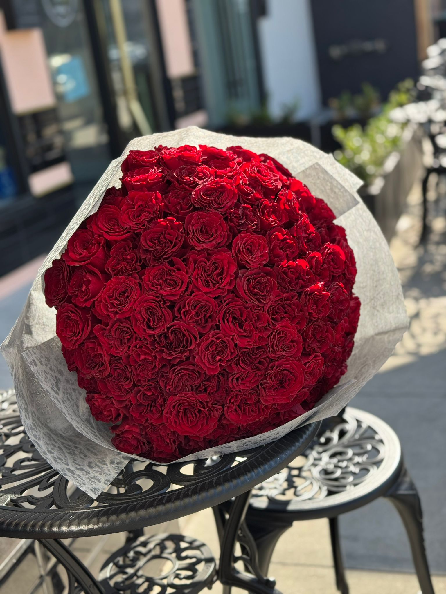 Hand - tied Bouquet of Red Roses