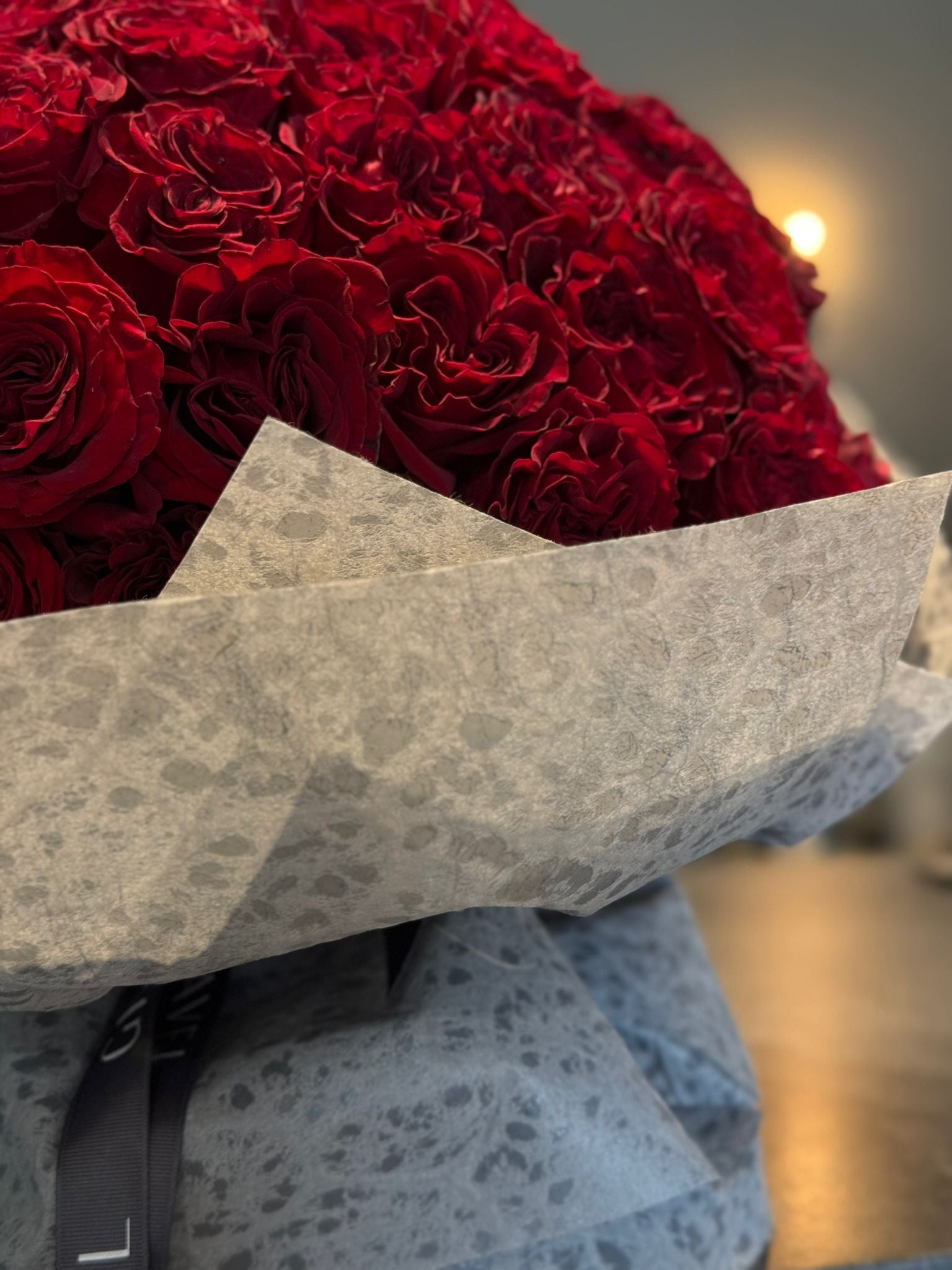 Hand - tied Bouquet of Red Roses