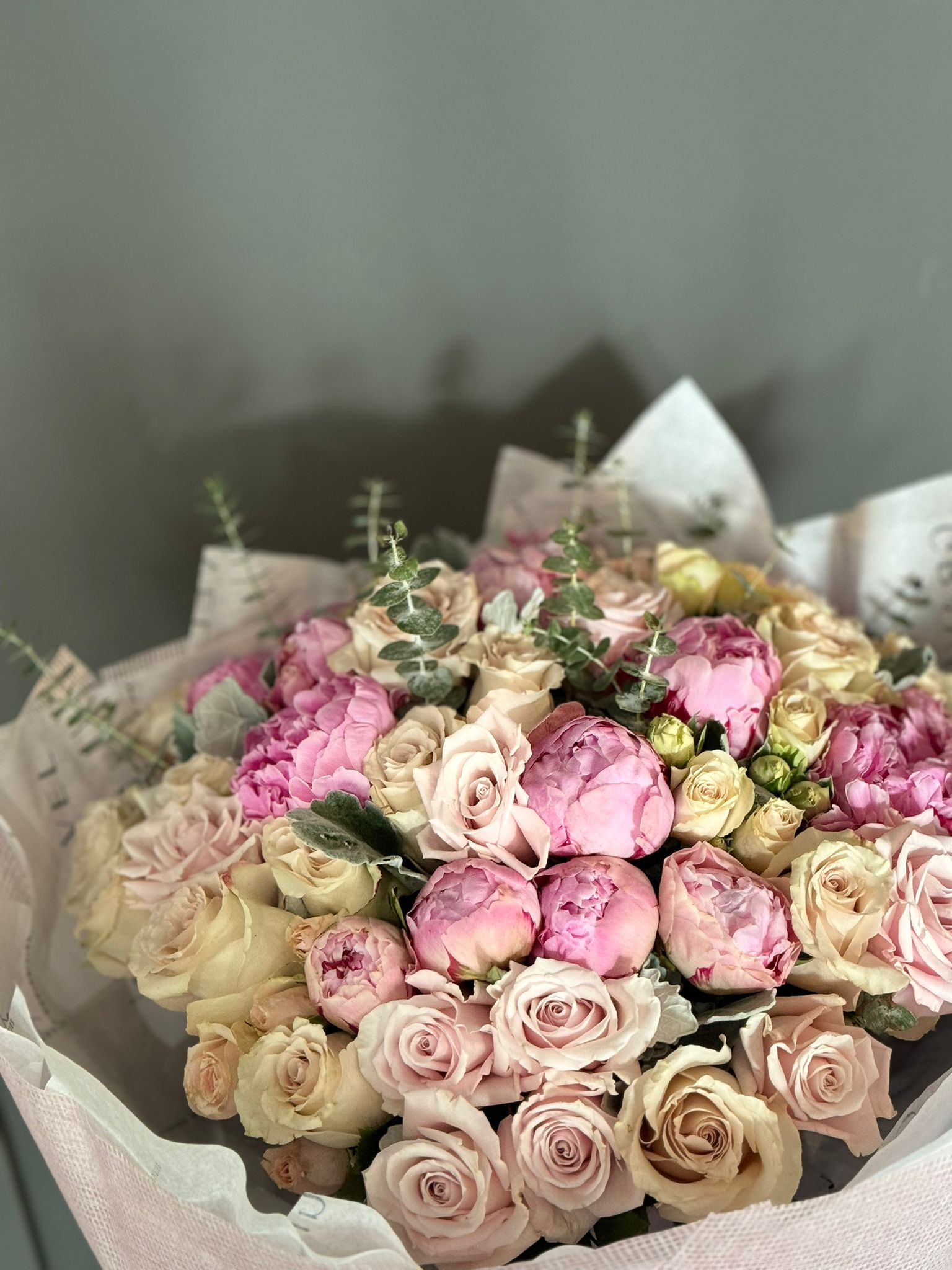 Pink Peonies, Eskimo Roses, Quicksand Roses, Irishka Spray Roses, and Eucalyptus Bouquet