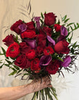 Red Freedom Roses, Purple Calla Lillies, Red Ranunculus, Agonis, and Italian Rucus Bouquet - Nationwide Shipping