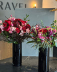 Red Roses, Lisianthus, Red Chrysanthemums, Agonis, and Italian Ruscus Hand Bouquet