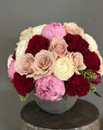 The Astrid - Pink Peonies, Red Roses, Ranunculus, and Quicksand Roses