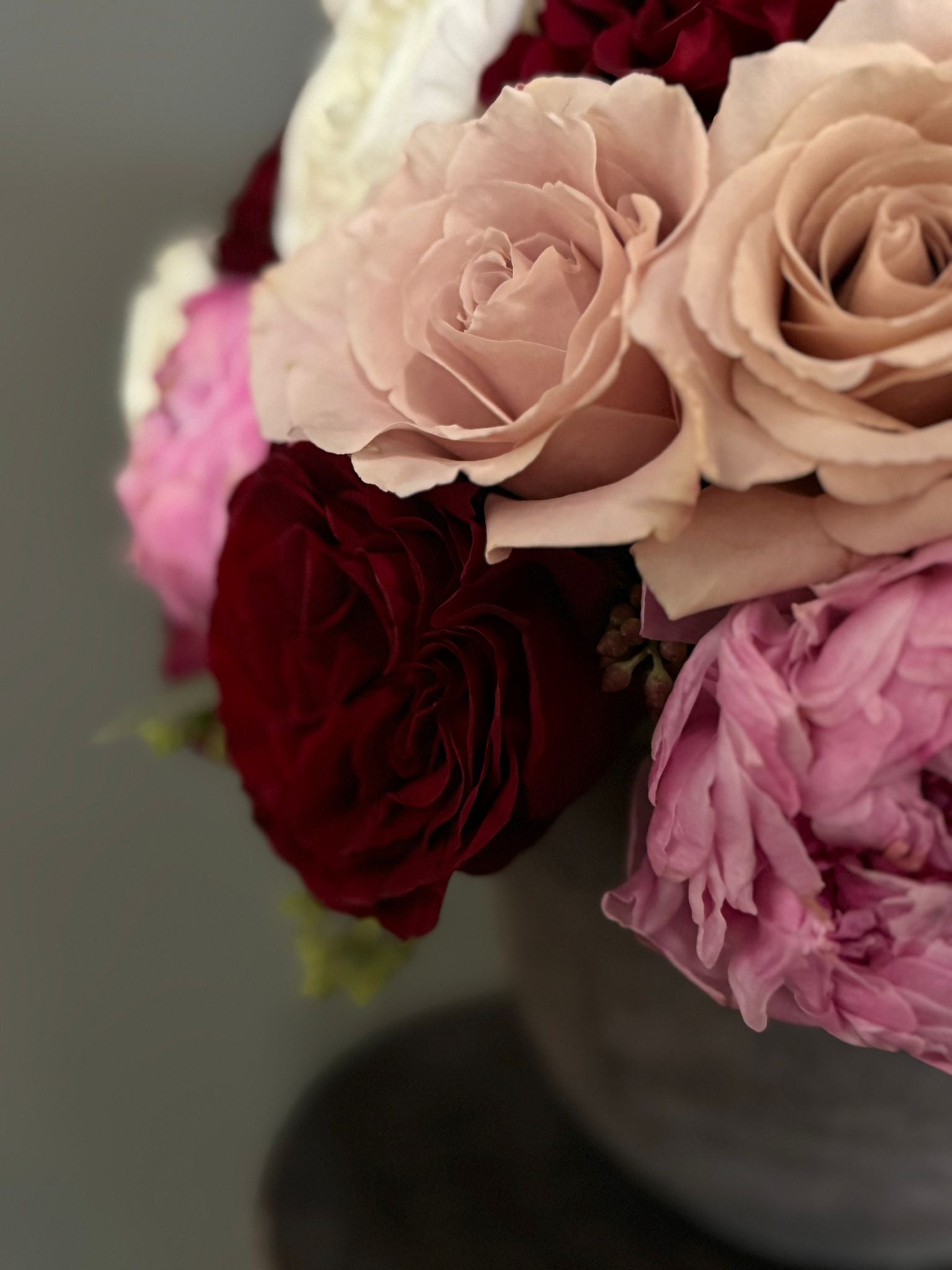 The Astrid - Pink Peonies, Red Roses, Ranunculus, and Quicksand Roses