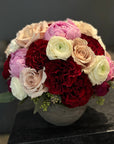 The Astrid - Pink Peonies, Red Roses, Ranunculus, and Quicksand Roses