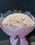 75 Pink Eskimo Roses Valentine's Day Hand Bouquet