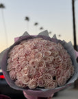 75 Pink Eskimo Roses Valentine's Day Hand Bouquet