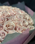 75 Pink Eskimo Roses Valentine's Day Hand Bouquet