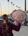 75 Pink Eskimo Roses Valentine's Day Hand Bouquet