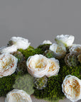 Roses placed in preserved moss