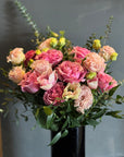 Pink Garden Roses, Pink Animons, Light Pink Lisianthus, and Italian Ruscus Hand Bouquet