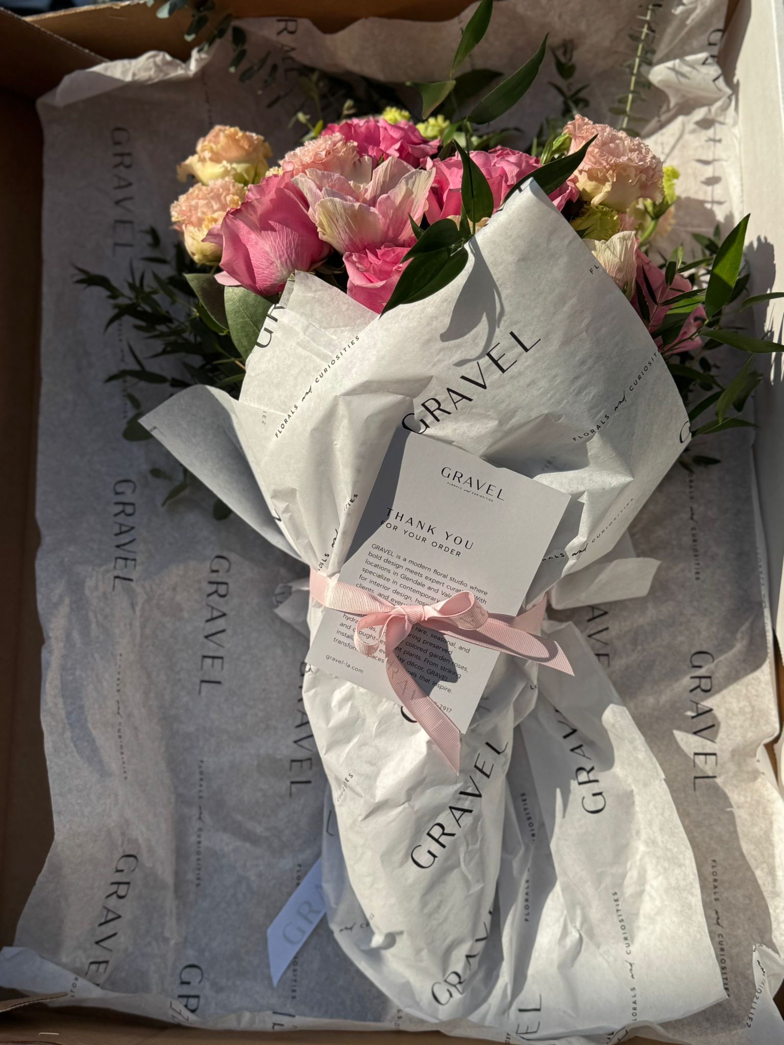 Pink Garden Roses, Pink Animons, Light Pink Lisianthus, and Italian Ruscus Hand Bouquet