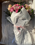 Pink Garden Roses, Pink Animons, Light Pink Lisianthus, and Italian Ruscus Hand Bouquet