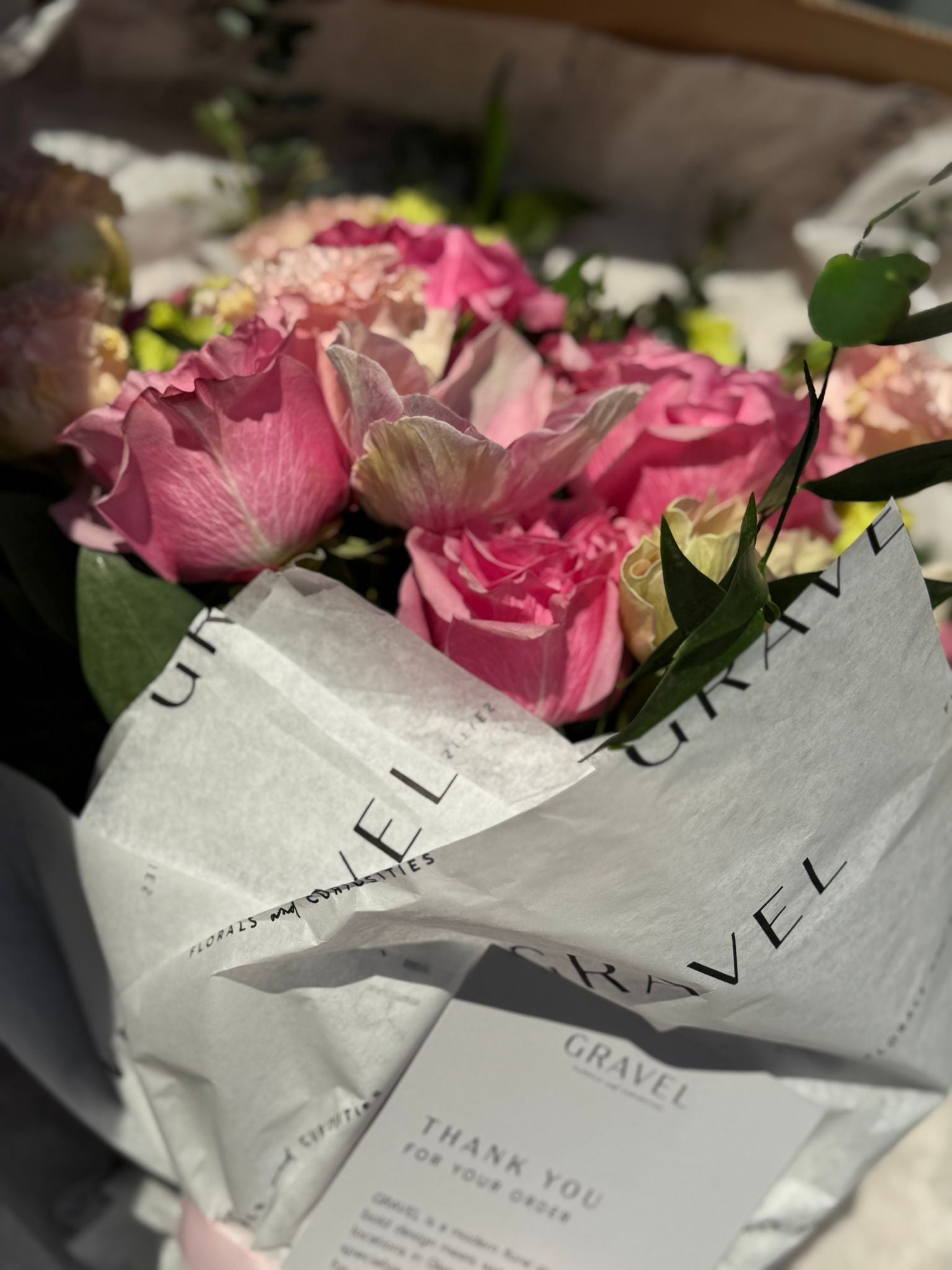 Pink Garden Roses, Pink Animons, Light Pink Lisianthus, and Italian Ruscus Hand Bouquet