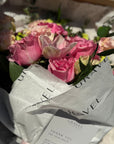 Pink Garden Roses, Pink Animons, Light Pink Lisianthus, and Italian Ruscus Hand Bouquet