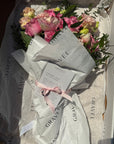 Pink Garden Roses, Pink Animons, Light Pink Lisianthus, and Italian Ruscus Hand Bouquet