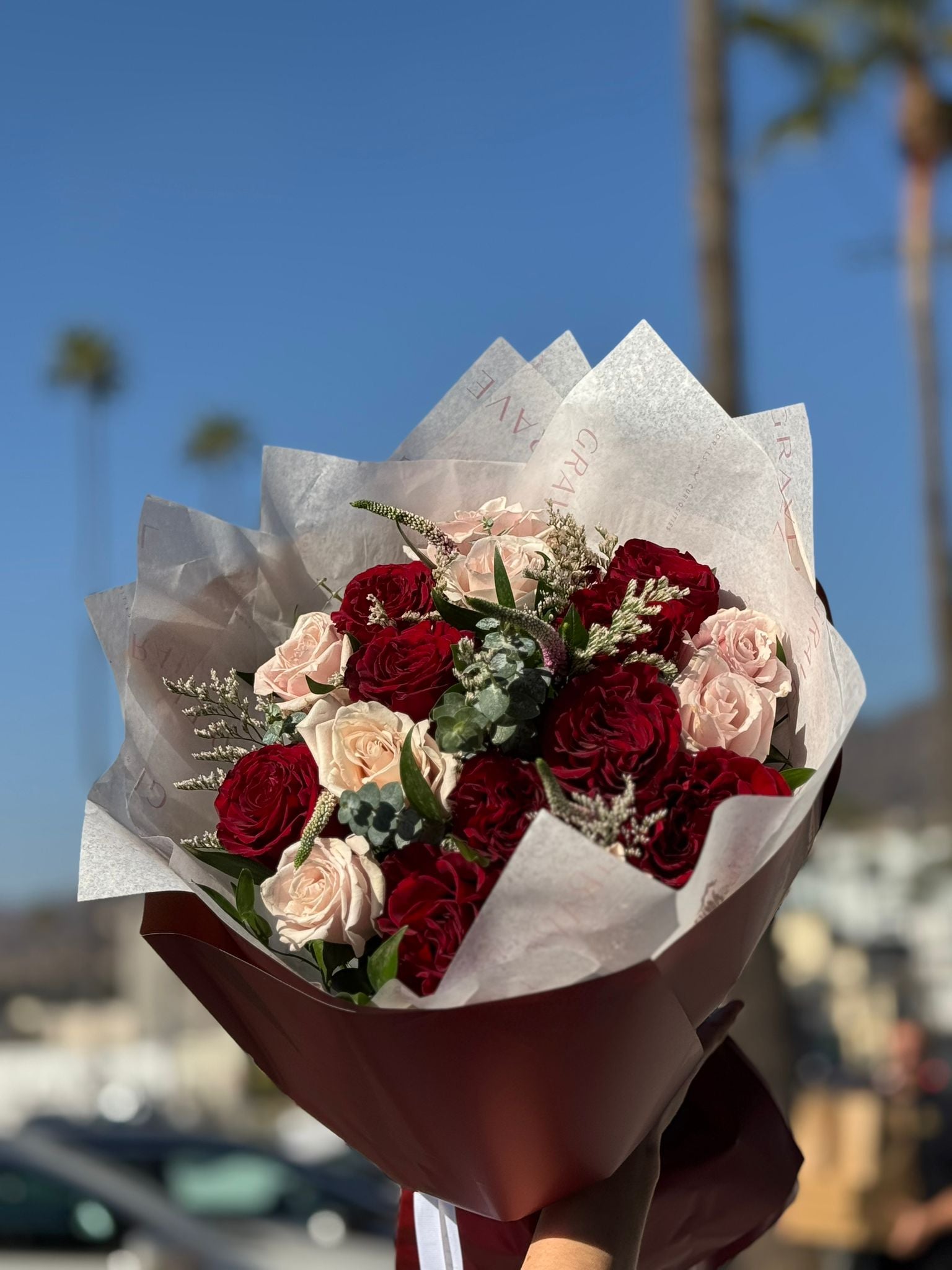 Red Hearts and Pink Eskimo Roses Valentine's Day Bouquet