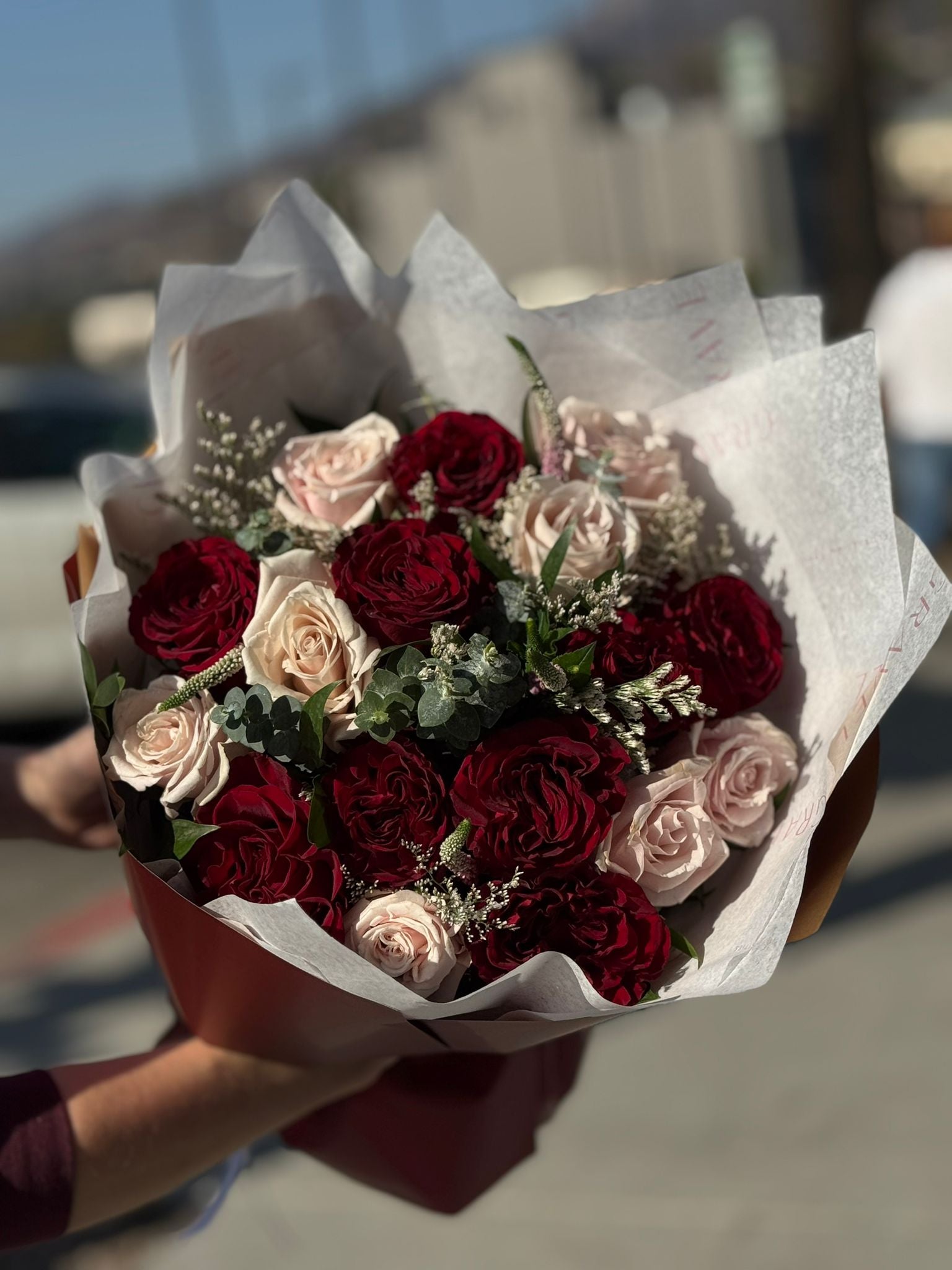 Red Hearts and Pink Eskimo Roses Valentine's Day Bouquet