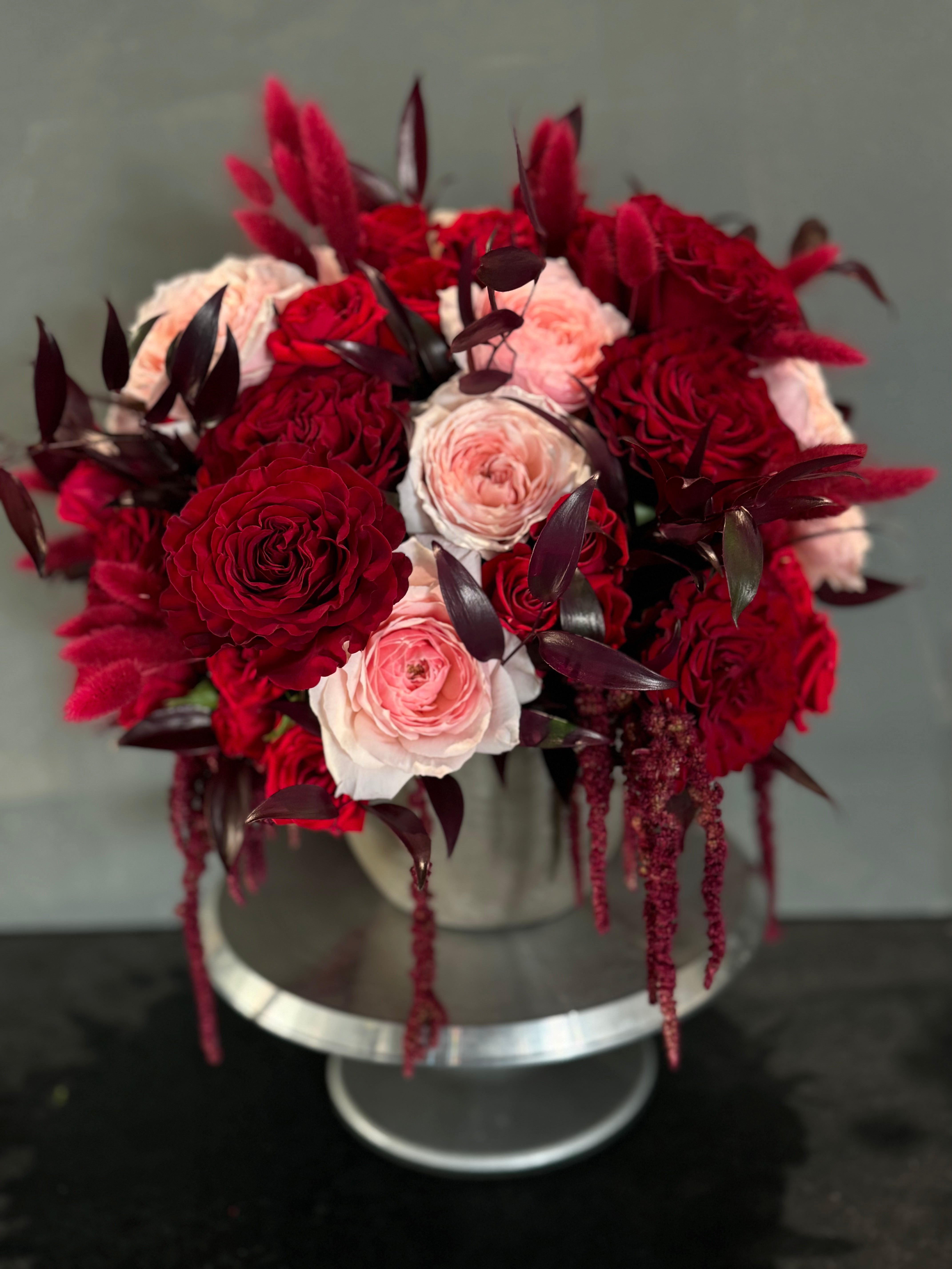 Red and Light Pink Garden Rose Bouquet Closeup